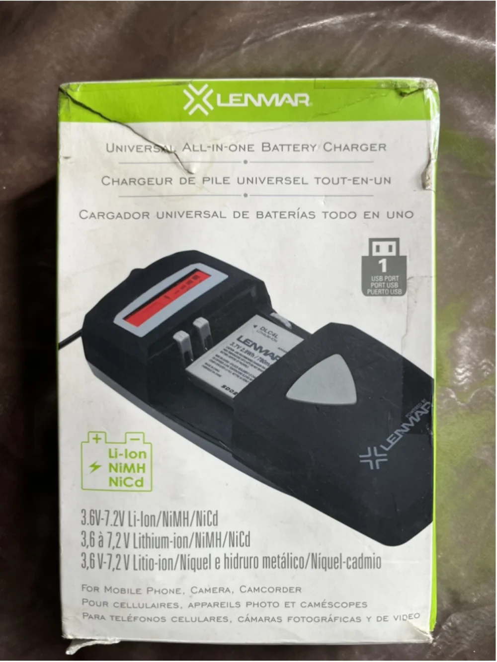 RARE FINE All-in-one battery charger for Mobile Phones, Cameras, and Camcorders